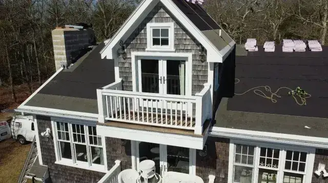 Finished roof on a home with a front porch