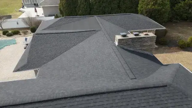 Aerial view of a completed roof replacement
